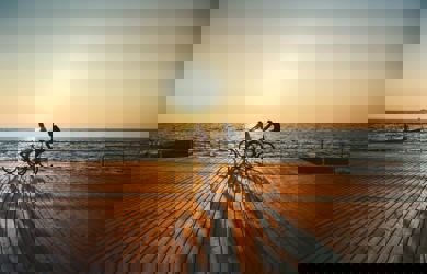 couple cycling on the pier 